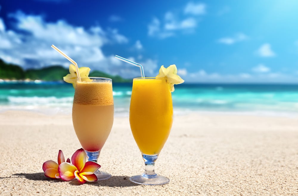 fresh fruit juices on a tropical beach